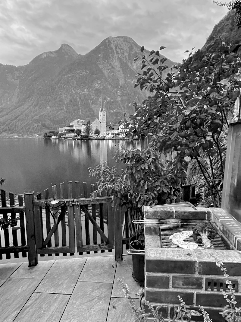 Grilling trout from the lake over charcoal on our patio.