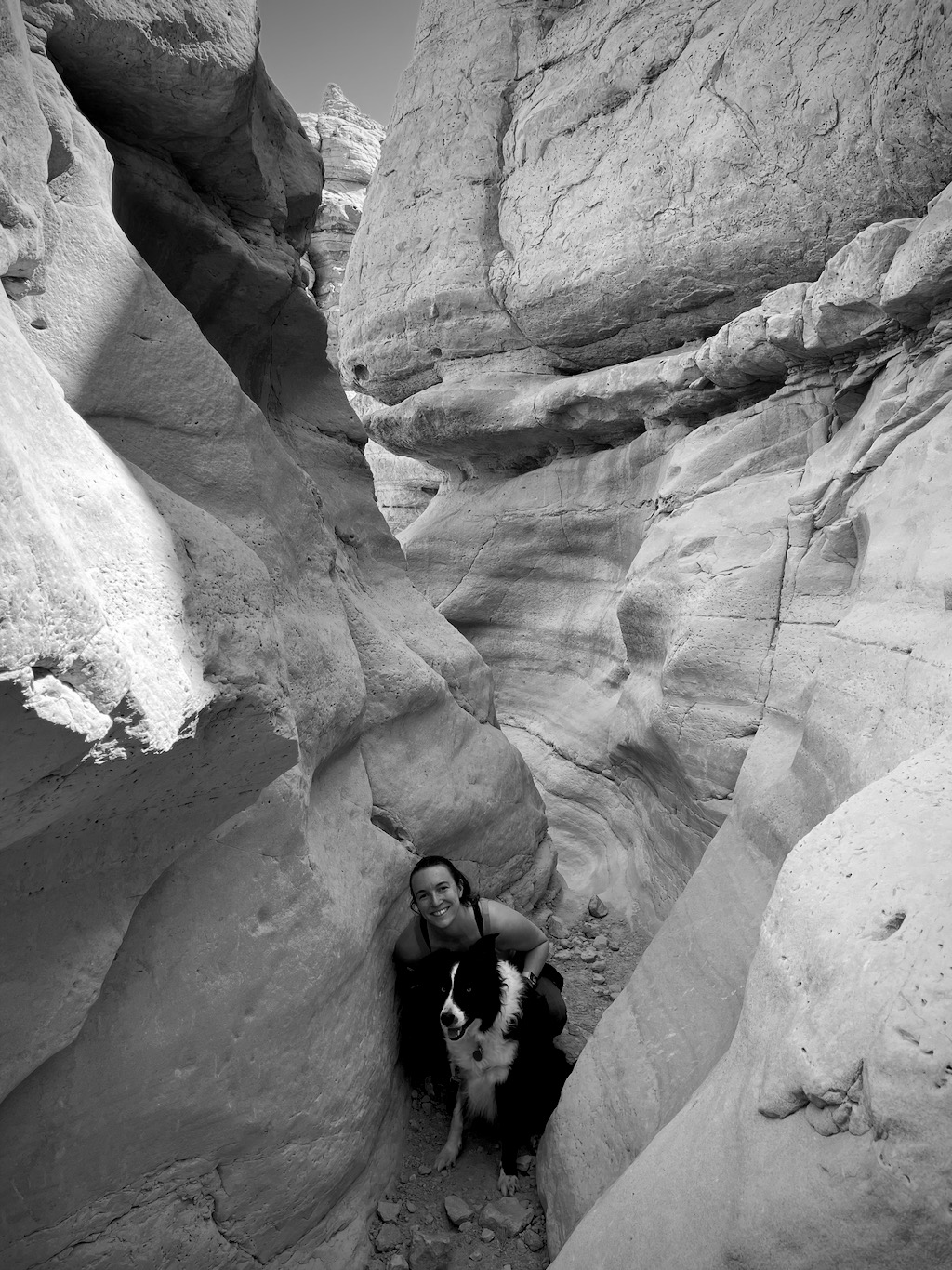 Climbing through the slot canyon at Plaza Bianco.