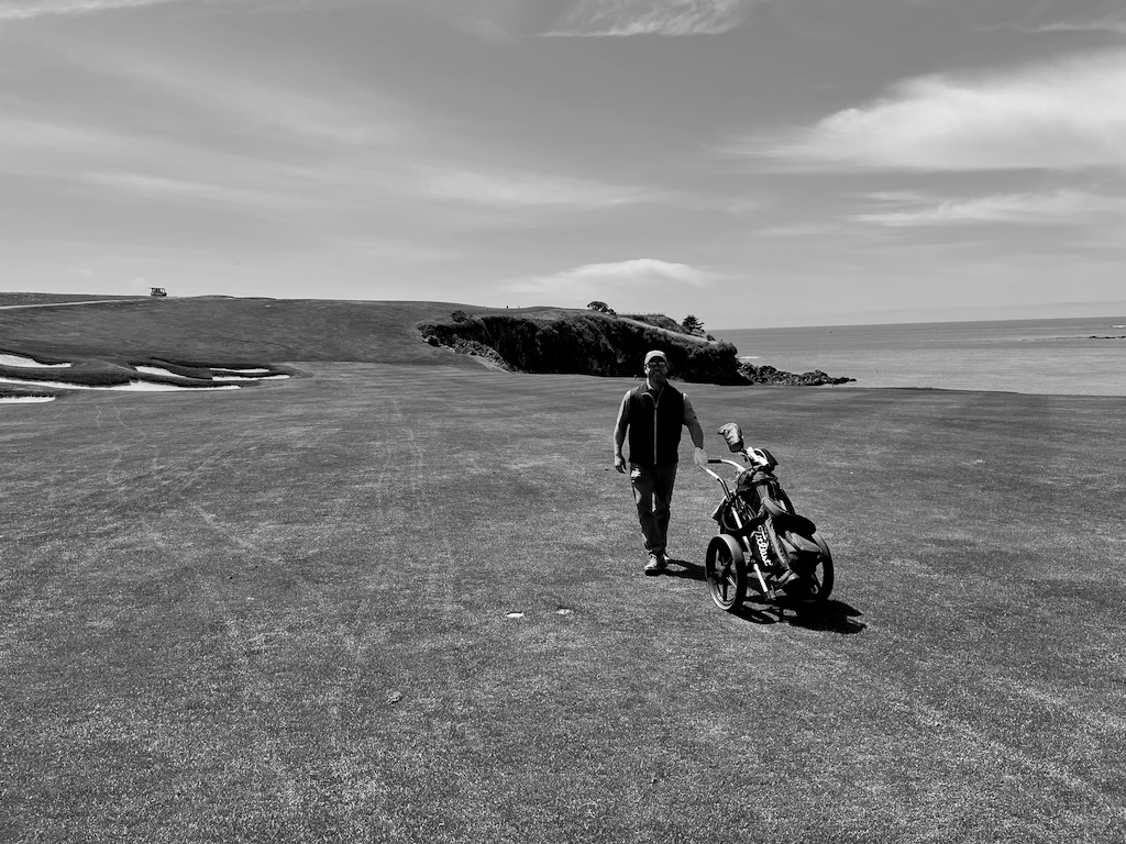 Dad on hole 6. The plateau in the distance you have to hit on top of looks small, but is actually four stories high.